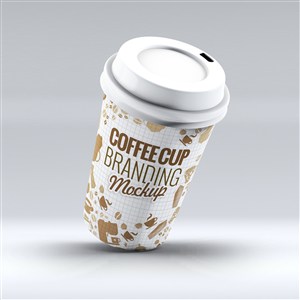 带盖的倾斜的一次性咖啡杯贴图样机
