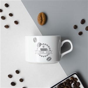 咖啡豆中间的咖啡杯贴图样机