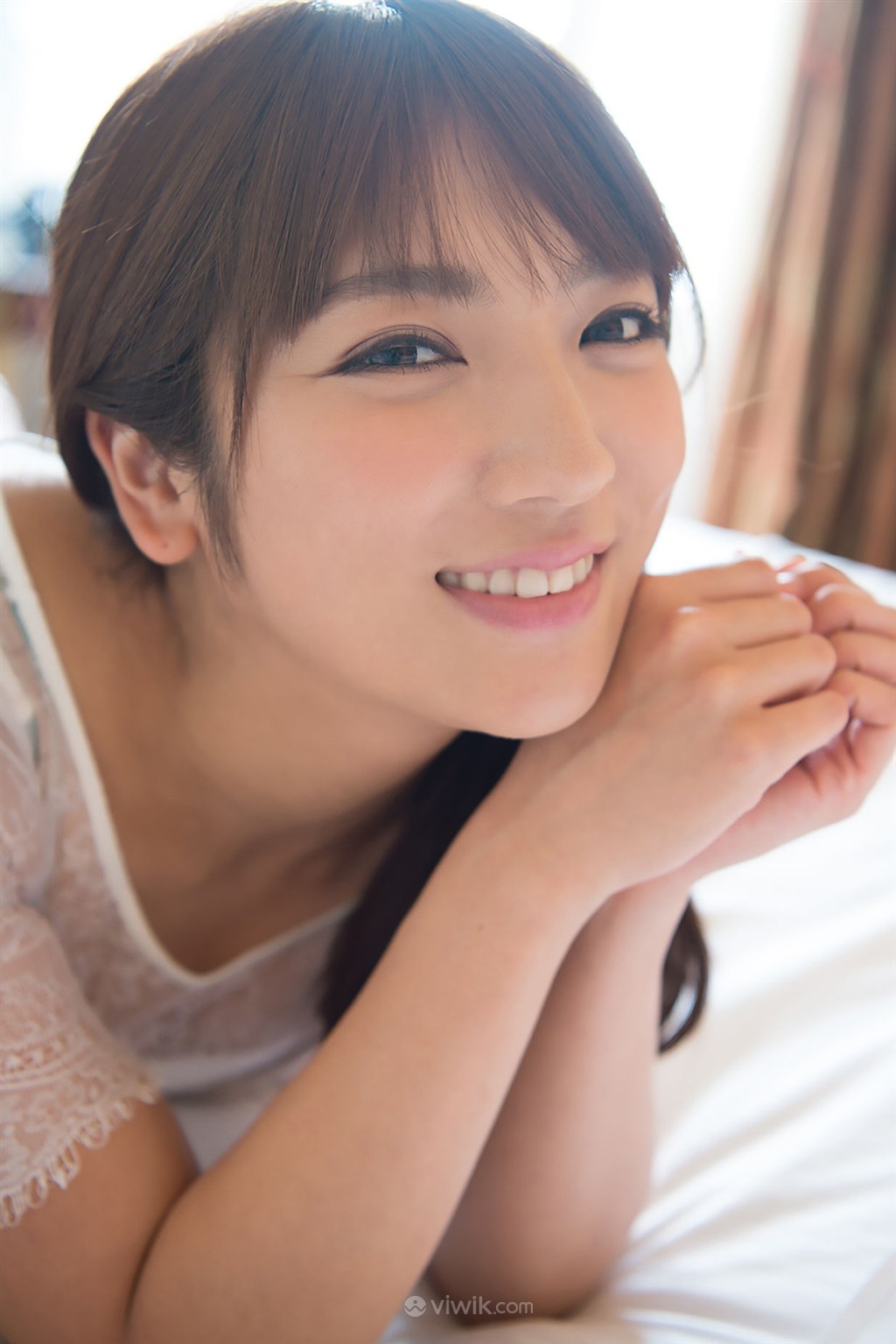 呲牙微笑日本美女性感mm图片