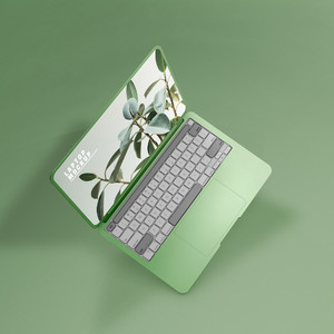 绿色背景悬浮的笔记本电脑贴图样机
