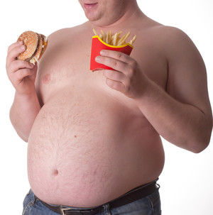 肥胖者吃垃圾食品健身圖片